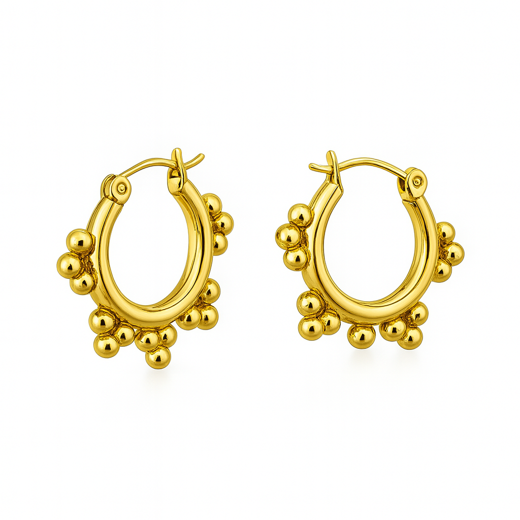 Gold hoop earrings with spherical embellishments on a white background