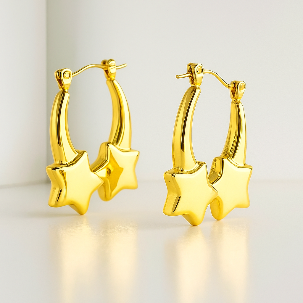 Pair of shooting star gold hoops with dangling charms