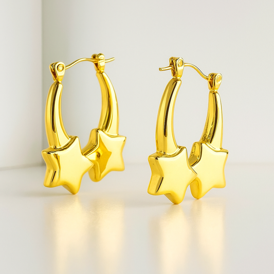 Pair of shooting star gold hoops with dangling charms